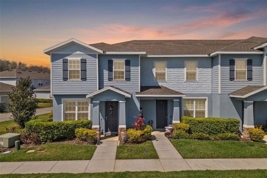 One or more photo(s) has been virtually staged. Experience the ultimate indoor-outdoor lifestyle in this stunning Asturia end-unit townhouse, featuring a private backyard oasis that truly sets it apart. The pavered courtyard is a showstopper, designed for relaxation and entertaining with a hot tub, gazebo, and full privacy fencing. Inside, the open-concept first floor impresses with high-end finishes, including upgraded 42 inch cabinetry, a glass backsplash, granite countertops, and a gourmet kitchen equipped with stainless steel appliances and a gas stove.

Architectural details like the custom feature wall in the living room and premium plantation shutters throughout add a layer of modern elegance and value. Upstairs, the primary suite serves as a true retreat, featuring a rustic barn door entry, a spacious walk-in closet, and an en suite bathroom with double sinks and a large walk-in shower. Two additional bedrooms, a second full bath, and a functional laundry room with custom shelving complete the second level.

Living in the award-winning Asturia community means access to a resort-style pool, a state-of-the-art fitness center, a luxury clubhouse, and miles of scenic walking and biking trails. This move-in-ready home is perfectly positioned for an easy commute via the Suncoast Parkway and is just minutes from the premier shopping and dining at SR 54. Zoned for top-rated Pasco County schools including Odessa Elementary, Seven Springs Middle, and J.W. Mitchell High, this property offers the perfect blend of luxury and convenience. View the included video tour and floor plan to see why this is one of the most desirable units in the neighborhood