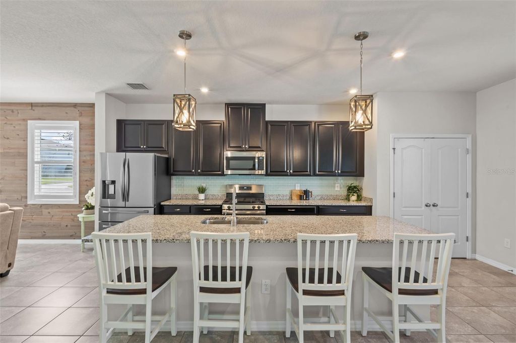 Photo of 2327 Pergola Way, Odessa, FL 33556 (MLS # TB8484790)