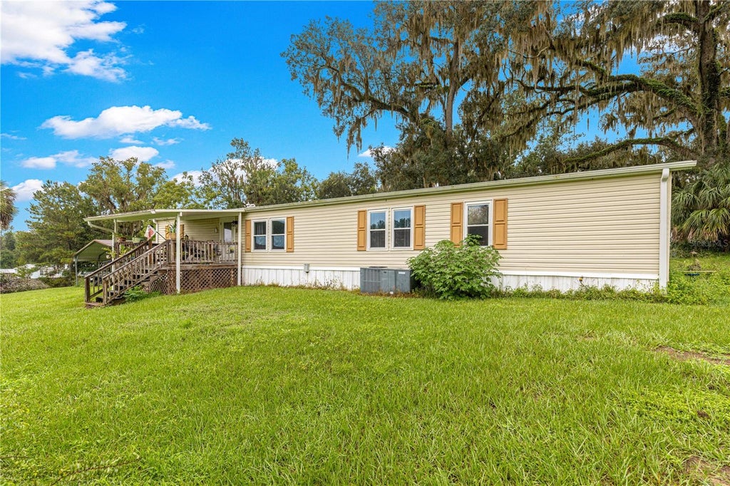 Photo of 5135 SE 125th Street, Belleview, FL 34420 (MLS # OM733629)