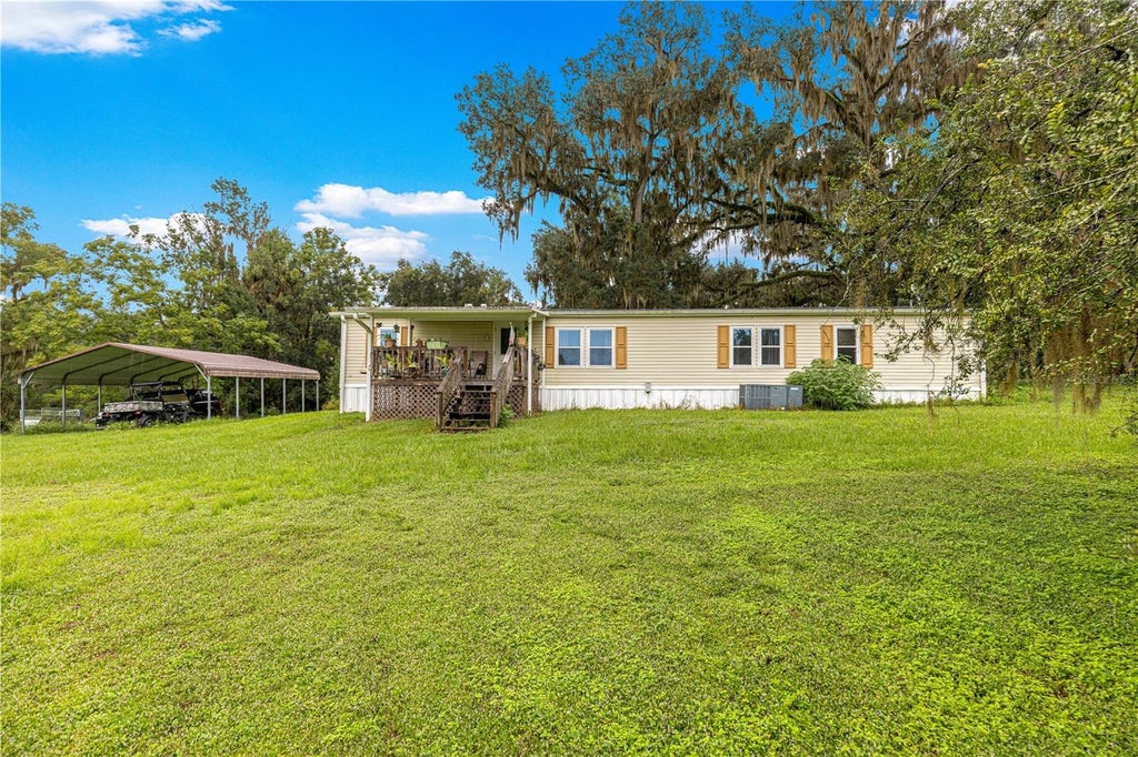 Photo of 5135 SE 125th Street, Belleview, FL 34420 (MLS # OM733629)