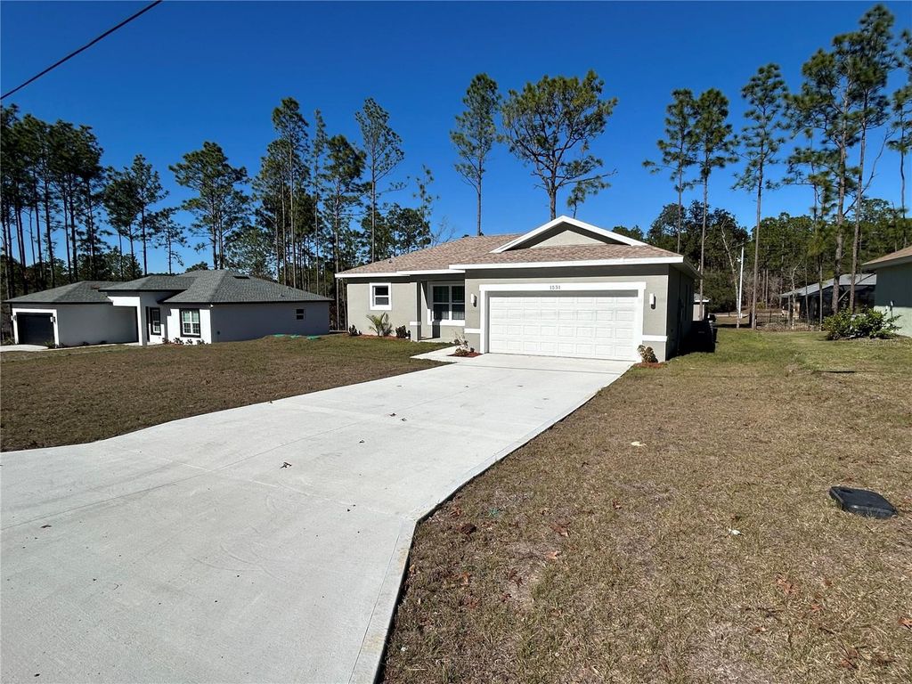 Photo of 1531 W Gainsboro Lane, Citrus Springs, FL 34434 (MLS # O6373622)