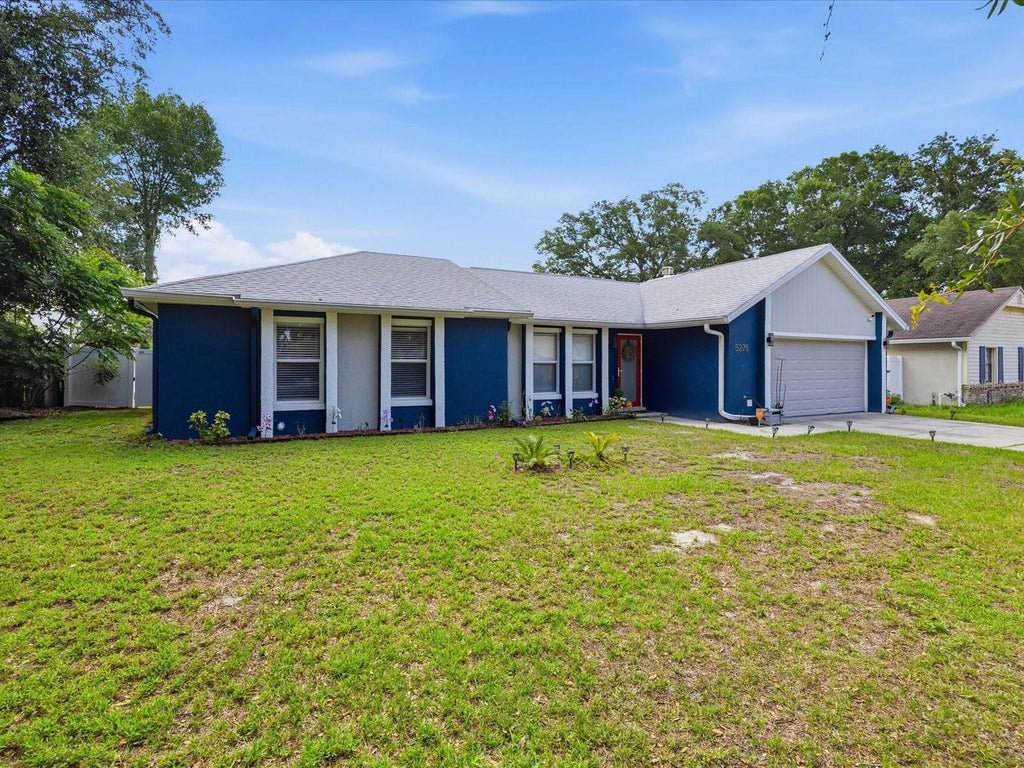 Photo of 5275 Signal Hill Road, Orlando, FL 32808 (MLS # O6419857)