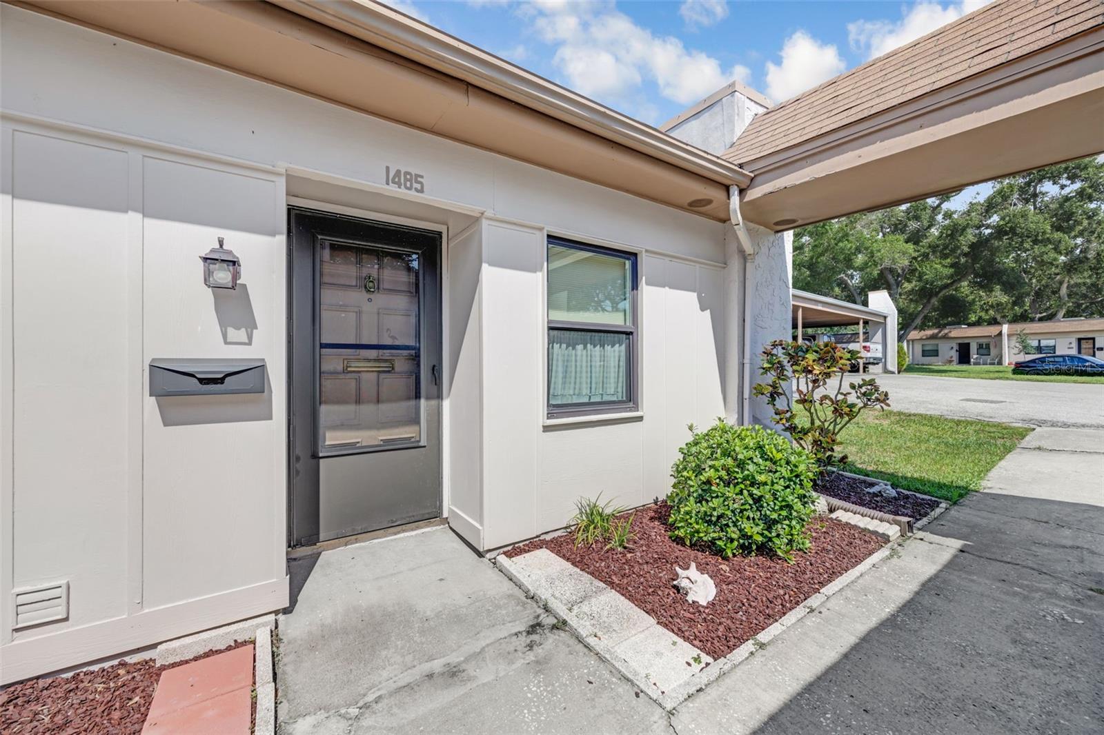 Motivated Seller! Discover this charming 1-bedroom, 1-bath villa-style condo in the popular 55+ community of Mission Hills in Clearwater. This well-maintained, partially furnished home features an open-concept layout with a spacious living and dining area, and a bright Florida room that leads to a paver patio overlooking a serene open yard. The bedroom is generously sized, and the full bathroom, with a tub/shower combo, is conveniently located off the main living area for easy access. Enjoy year-round comfort with a new A/C unit already in place. Mission Hills offers a vibrant, active lifestyle with amenities such as a heated pool, clubhouse, fitness center, bocce ball, shuffleboard, ping pong, cornhole, and a library. Ideally situated near shopping, dining, airports, and beautiful Gulf beaches. For added peace of mind, this home is located in an X flood zone and has a new AC unit. The monthly condo fee includes ground maintenance, exterior painting, roof, water, sewer, trash, gas, basic cable, internet, and Wi-Fi. Schedule your showing today and make this lovely home yours! Seller is also offering up to $4,800.00 in buyer closing costs, prepaid, or rate buy down with an acceptable terms!