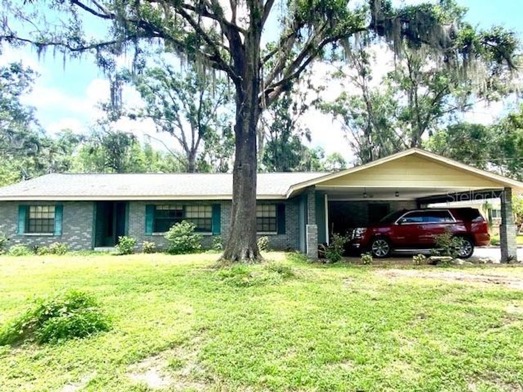 Photo of 4832 School Road, Land O Lakes, FL 34638 (MLS # TB8413503)