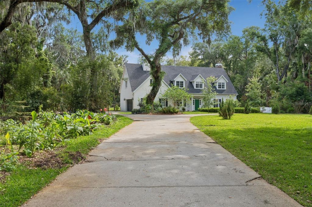 Photo of 1244 Elysium Boulevard, Mount Dora, FL 32757 (MLS # O6399753)