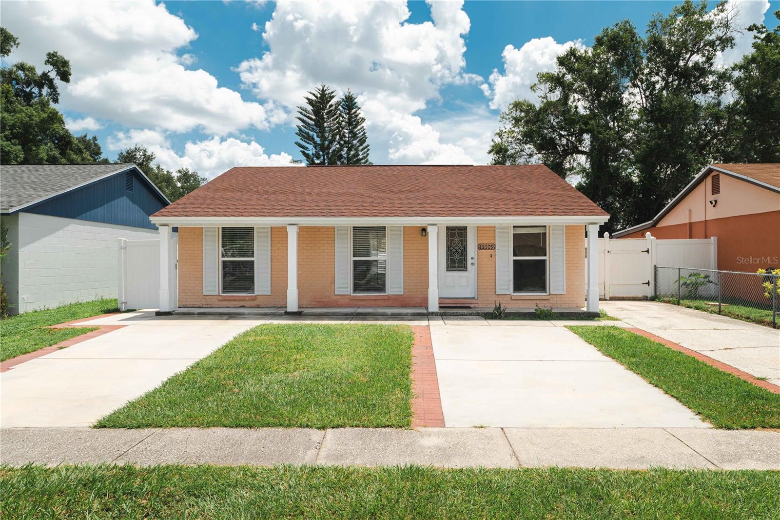 *NEW ROOF 2025* No HOA - No CDD! NO FLOOD ZONE! PERFECT 3/2 HOME IN NORTH TAMPA! Super cute house located in the highly demanded NORTHDALE/Carrollwood area. The main living areas have vaulted ceilings allowing the light to filter through from front to back. The kitchen with granite counters, wood shaker style cabinets and stainless-steel appliances divide the main living spaces. Master bedroom has an exit to the exterior and the suite bathroom with a walk in style shower. The dining room has plenty of room to look out through the double sliding glass doors which step out onto the large 350 square foot covered screed in porch. The back yard has installed new fence in 2023. The laundry/utility room is extra-large for the washer, dryer, water heater and plenty of storage. The hallway has 3 closets for additional storage and the 2 guest bedrooms are at the front of the house that share a guest bathroom with a large walk-in shower. Conveniently located near great restaurants, grocery, shopping, parks, Veterans Expressway, and North Dale Mabry this home is a great find! A/C: 2017 - HOT WATER HEATER: 2019