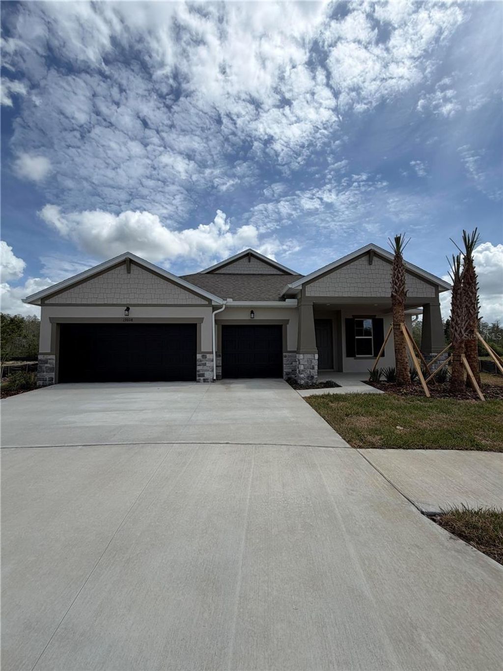 Photo of 17608 Valleywood Pkwy, Land O Lakes, FL 34638 (MLS # J999506)