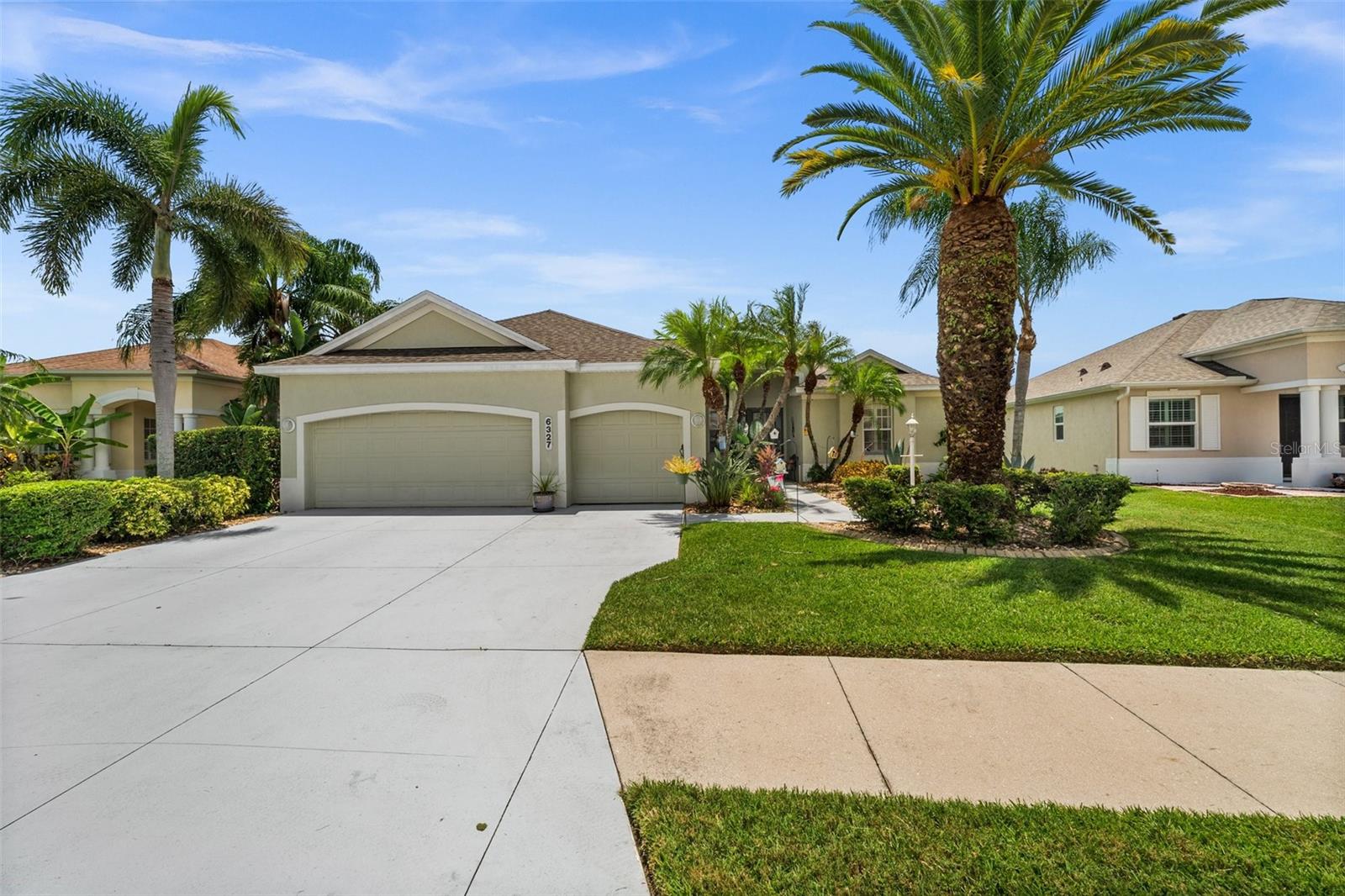 Spacious and beautifully maintained, this 4-bedroom, 3-bath home offers comfort, style and a serene lakefront setting. You’ll find tile flooring throughout the main areas, with laminate in all the bedrooms. Both the living and family rooms open up to a large screened lanai featuring a private in-ground pool and a soothing waterfall — the perfect place to relax while enjoying lake views and stunning sunsets.
The home’s layout is open and inviting, with a seamless flow between the rooms. The kitchen overlooks the cozy family room and is outfitted with granite countertops, a breakfast bar, stainless steel appliances, and a gas range — ideal for everyday living and entertaining. There’s also a formal living room and dining room for larger gatherings.
One of the bedrooms is ideal for a home office, complete with built-in shelving, cabinetry and a small walk-in closet. The master suite features two walk-in closets and a spacious bathroom with dual vanities, a soaking tub and a separate shower.
Additional highlights include a 3-car garage, a laundry room with a utility sink and storage cabinets, and a fantastic location close to everything — just west of I-75 off SR 70 and near University Parkway, Lakewood Ranch, UTC, shopping, dining and more.