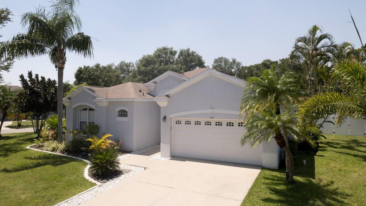 Stunning 3 Bedroom, 2 Bath Furnished Pool Home with Lake View! Welcome to this beautifully updated corner-lot home offering comfort, style, and convenience. From the moment you arrive, you’ll be captivated by the serene lake views from the front of the property. Step inside to an open-concept layout that seamlessly connects the kitchen, dining area, living room and family room (game room)—perfect for everyday living and entertaining. The gourmet kitchen features navy cabinetry, granite countertops, and newer stainless-steel appliances, creating a sleek modern feel. Ceramic tile flooring flows throughout the home for a clean, low-maintenance touch. Enjoy Florida living at its best with sliding doors that open to a screened, heated saltwater pool and covered lanai. Just beyond, a private deck offers the ideal space for sunbathing or hosting gatherings and a fenced backyard. The spacious primary suite includes a walk-in closet and a spa-like ensuite with dual sinks, a soaking tub, and a walk-in shower. Two guest bedrooms and a full bath with a tub/shower combo provide comfort and privacy for family or guests. This home is offered fully furnished with modern décor, plus a pool table for added fun and entertainment. Additional features include an inside laundry room and abundant natural light throughout. Perfectly located near a boat ramp with access to the Manatee River, this home offers convenience to hospitals, shopping, dining, banks, and is less than 15 miles from the area’s beautiful Gulf beaches.
