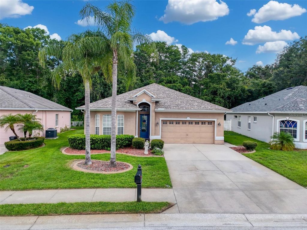 Photo of 12200 Hunters Lake Drive, New Port Richey, FL 34654 (MLS # TB8400571)