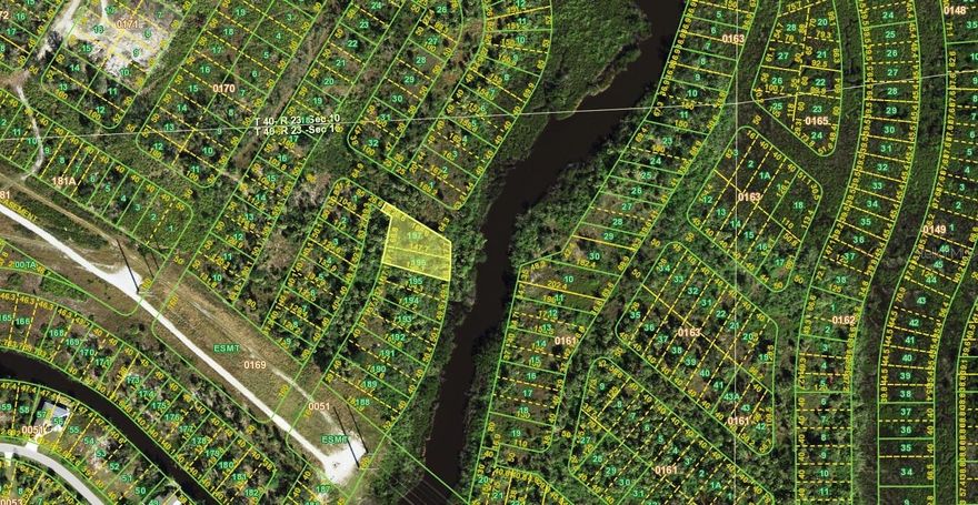 Build your Florida waterfront dream on this oversized lot at 1582 Halmstad Dr, Punta Gorda, FL 33983, located in the desirable Harbour Heights area. This larger parcel is situated just off a canal that connects directly to Bay Harbor, providing convenient access to the Peace River and Charlotte Harbor for boating, fishing, and kayaking. Enjoy the benefits of waterfront living without the congestion of larger communities, all while being just minutes to I-75, shopping, dining, parks, and historic downtown Punta Gorda. With ample space to design a custom home, add a pool, and create your ideal outdoor living area, this property offers flexibility and long-term value in a growing waterfront neighborhood. Whether you're looking to build now or invest for the future, this canal-connected lot is an exceptional opportunity to secure your place in Southwest Florida’s boating lifestyle.