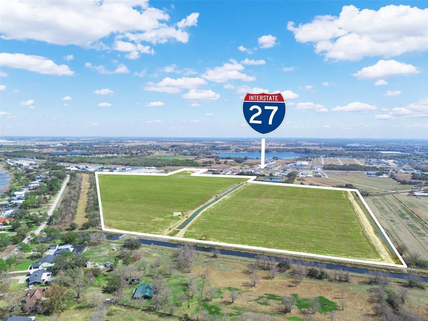 Offered for sale is an 88.45± acre tract positioned along the Hwy 27 corridor near Dundee, Florida well suited for industrial and commercial
users seeking scale, visibility, and long-term flexibility. The property is currently under a sod land lease, providing interim holding income while a buyer completes due diligence, design, and entitlement work. A lease summary (term, rent, renewal options, and termination provisions) is
available upon request. A key development advantage is utility proximity: water is approximately 700 LF from the site along Hwy 27 (buyer to verify capacity, pressure, and exact point of connection with the utility provider). The acreage supports a wide range of concepts including industrial flex/warehouse, phased industrial park development, contractor and service uses, distributionsupport uses, and commercial frontage opportunities, subject to zoning and approvals. The surrounding corridor continues to strengthen with new and evolving retail and service amenities, including the nearby Winn-Dixie conversion to Aldi anticipated in summer 2026, reinforcing ongoing investment and daily-needs convenience for the local workforce.