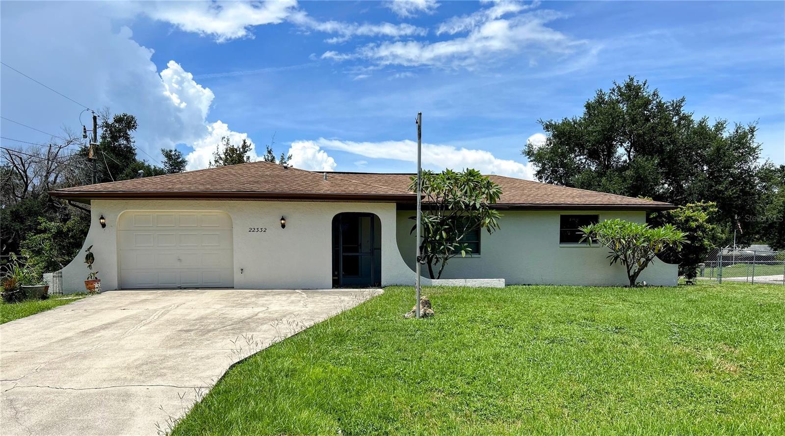 Welcome to your slice of Florida paradise! Nestled on a spacious corner lot in the heart of Port Charlotte, this well-maintained, move-in ready pool home blends comfort, style, and everyday convenience. Enjoy peace of mind with a brand-new roof being installed August 4, 2025, and freshly painted exterior for a crisp, clean finish.
Inside, natural light pours into the open floor plan, highlighted by timeless plantation shutters and soothing neutral tones throughout. The kitchen is the heart of the home—offering granite countertops, a breakfast bar, and abundant cabinet space—perfect for both entertaining and daily living. An interior laundry area located in the garage adds to the home’s functionality.
The primary suite is a true retreat, featuring a spacious walk-in closet and a private ensuite bath with direct access to the screened lanai—ideal for morning coffee or an evening dip in the pool. Step outside to your own private, fenced-in backyard oasis, complete with a sparkling in-ground pool, screened lanai, storage shed, and plenty of room to garden, play, or host gatherings.
Located in desirable Flood Zone X with no HOA and no CDD, this home offers the freedom to truly enjoy Florida living. Just minutes from shopping, dining, medical centers, and the beautiful Gulf beaches—this gem checks all the boxes and is priced to sell. Don't miss your opportunity to make it yours!