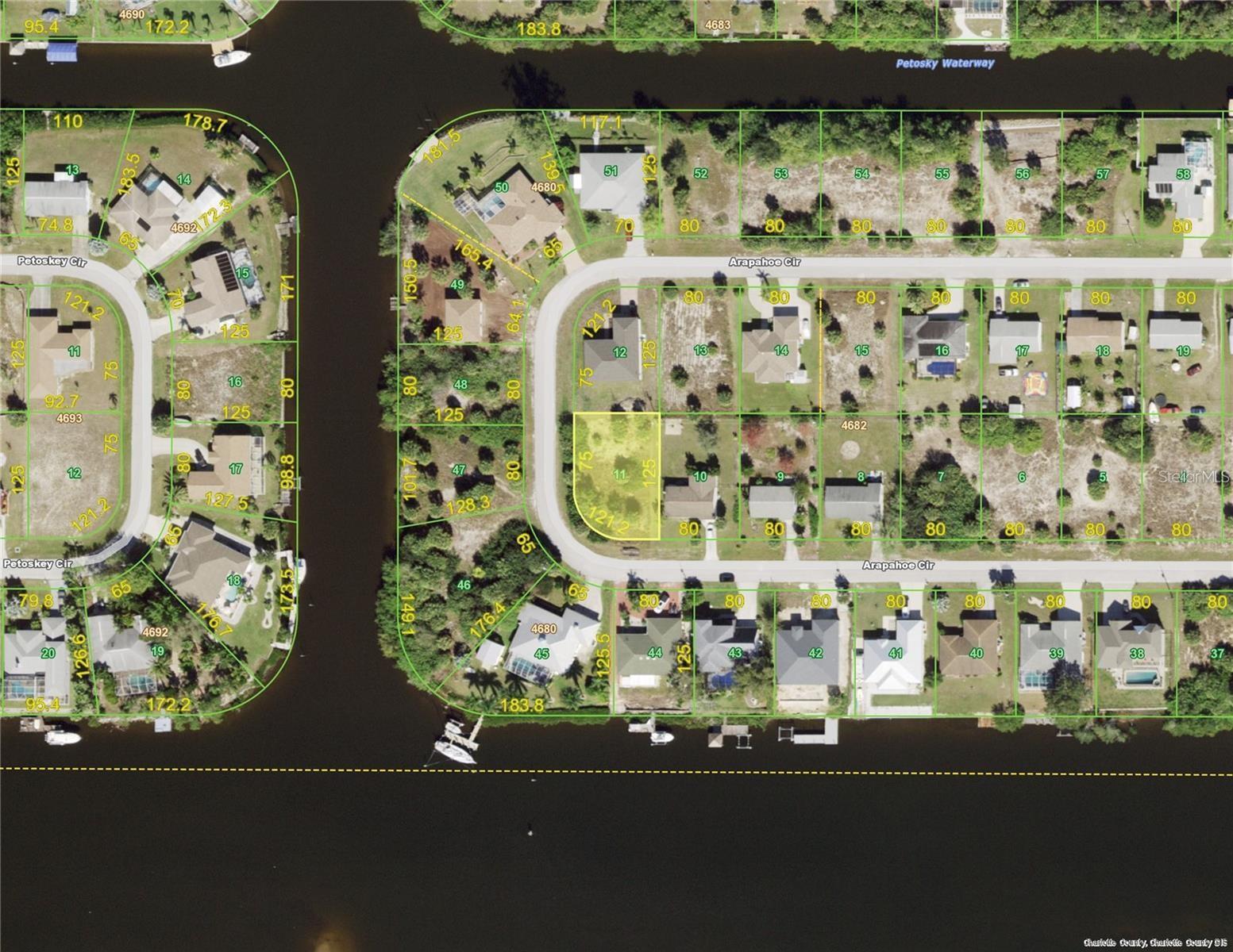 PORT CHARLOTTE - HERE IS YOUR CHANCE FOR A BEAUTIFUL BUILDABLE, CORNER LOT IN AN AREA NOTED FOR ITS FISHING AND BOATING. LOCATED ON A CIRCLE ROAD WHERE THERE IS LESS TRAFFIC, AND IT IS LOCATED NEAR THE EDGEWATER PUBLIC BOAT RAMP, VETERANS MEMORIAL PARK, SHOPPING, RESTAURANTS AND ACTIVITIES IN PORT CHARLOTTE AND PUNTA GORDA. IT HAS PUBLIC WATER AND SEWER. BUILD YOUR DREAM HOME IN PARADISE!