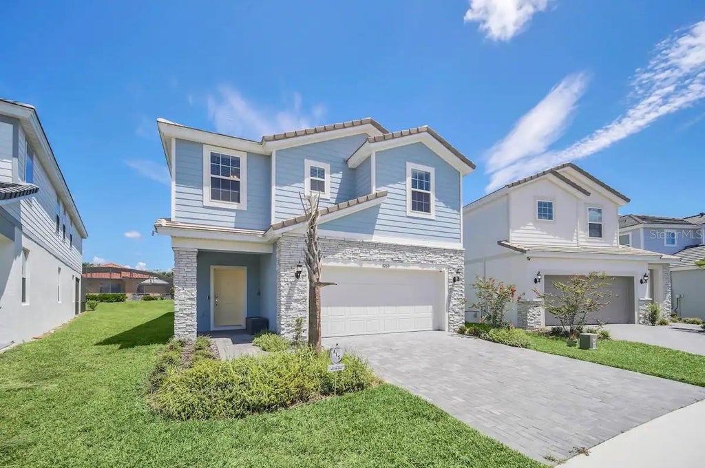 Photo of 7263 Oakmoss Loop, Davenport, FL 33837 (MLS # O6446304)