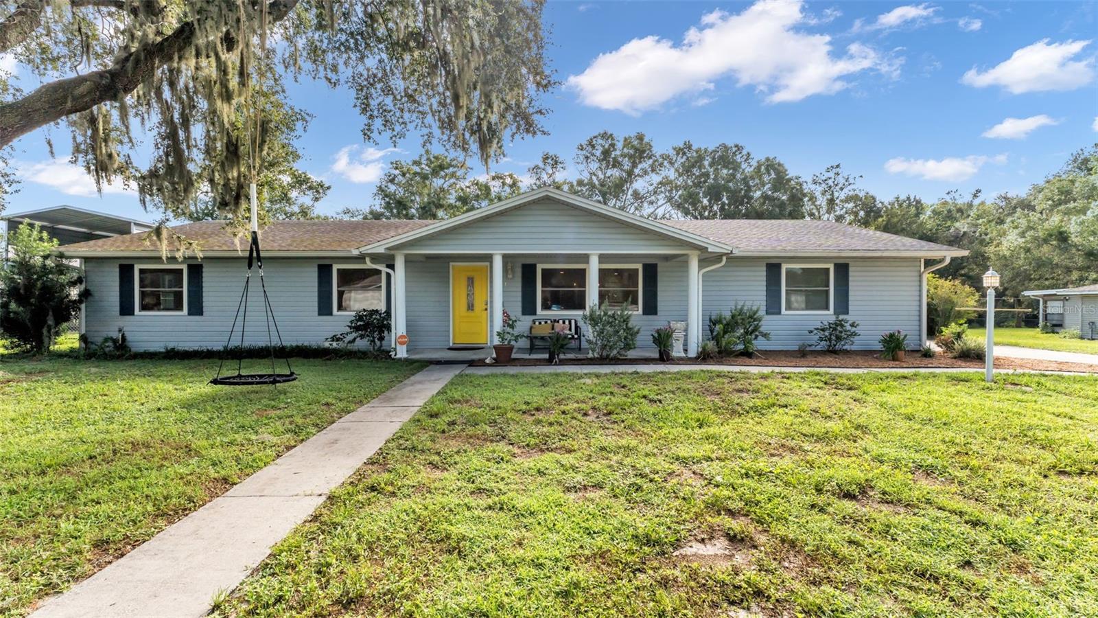 Welcome to your fully updated South Lakeland oasis! This 3-bedroom, 2-bathroom home is situated on just over a 1/3-acre fully fenced lot with no HOA. Tucked peacefully at the back of the neighborhood, this property is perfect for families, entertainers, and anyone seeking both comfort and space. Recent updates include the Roof (2020), A/C (2022), and Double Hung/Double Pane Windows throughout (1 year old)! Step inside to a spacious open floor plan showcasing modern updates throughout. The stunning kitchen was completely remodeled and is an entertainer’s dream—featuring quartz countertops, a large island with bar seating, stylish tile backsplash, abundant pantry storage, and updated appliances. The oversized master suite provides the perfect retreat, complete with double closets and a renovated en suite bath. Two additional bedrooms are generously sized, and the dedicated indoor laundry/utility room adds extra convenience. Enjoy Florida living year-round in the expansive enclosed Florida room, overlooking the large backyard with mature trees. This versatile space doubles as another living or entertaining area. Just outside, a recently installed wraparound concrete patio with aluminum awning creates the ultimate outdoor hangout for gatherings or relaxing evenings. Recent updates include: Roof (2020), A/C (2022), Double Hung/Double Pane Windows (1 year old), Water heater (2021), Kitchen remodel (2023), Concrete Patio (2023), Blow-in Insulation in Attic, Flooring throughout & Trim, Appliances, Toilets & Vanities, Light Fixtures, Switches & Outlets, and a paid off Vivint Security System. With its modern upgrades, functional layout, and prime South Lakeland location, this home truly checks all the boxes. Schedule your tour today!!
