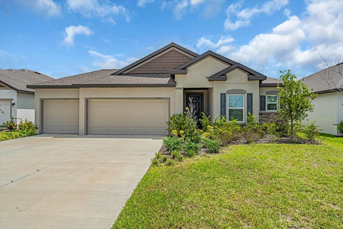 Welcome to your brand-new dream home in Bradenton! Built in 2024, this stunning 3-bedroom, 2-bathroom residence offers modern comfort and style in a sought-after gated community. From the moment you arrive, you’ll notice the oversized driveway leading to a spacious 3-car garage—perfect for multiple vehicles, storage, or a workshop space.
Inside, you’ll find a thoughtfully designed open floor plan with contemporary finishes, abundant natural light, and a seamless flow ideal for both everyday living and entertaining. The kitchen features sleek cabinetry, modern appliances, and a generous island overlooking the living and dining areas. The primary suite offers a private retreat with a well-appointed en-suite bathroom and walk-in closet, while two additional bedrooms provide space for family, guests, or a home office.
Enjoy peace of mind and privacy in this gated neighborhood which offers a lovely resort style pool and playground, all while being conveniently located near Bradenton’s shopping, dining, golf courses, and Gulf Coast beaches. Another fantastic perk of this home and location is that it is not in a flood zone!
Whether you’re looking for your forever home or a modern Florida retreat, this property is ready to welcome you.