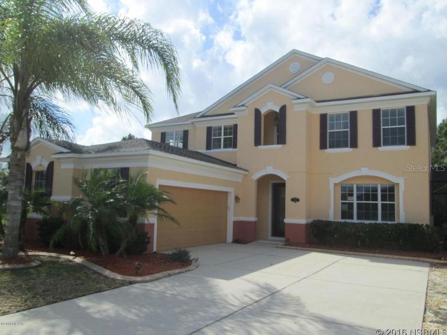 "Stunning 2 Story Pool Home in Sugar Mill Gardens. This spacious home features 4 Bedrooms, 3 Bathrooms, a Large Kitchen with Center Island-Granite Counter Tops-and Breakfast Bar. Floor Plan is great for entertaining-Formal Living & Dining Areas plus a Generous Sized Family Room on the first floor. The Family will love the Screened Pool & Patio area complete with a Summer Kitchen. Mom & Dad will love the cul de sac location and 2nd floor Living Area for the kids. Master Suite offers Double Vanities with Vessel sinks-separate Soaking Tub & Shower and Large Walk-In Closet. Convenient location minutes to I-95, the Beach, and the Golf Courses. This is a Fannie Mae HomePath property." ;Water: City