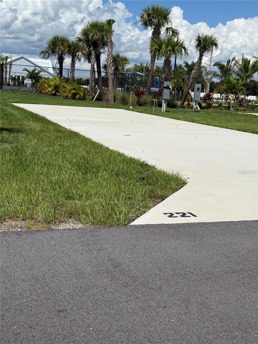 Welcome to Palm Breeze RV Resort, active community nestled in the heart of beautiful Punta Gorda, Florida. This turnkey lot offers an exceptional opportunity to own a piece of paradise and enjoy the best of Florida's RV or Park Model lifestyle. The lot is a spacious site, perfectly designed to accommodate even the largest RVs, complete with a sturdy concrete pad and full utility hookups, including 50/30 amp electric, water, and sewer connections. Whether you’re looking for a seasonal getaway or vacation, this lot offers everything you need for
comfortable living. The resort’s clubhouse is the hub for social gatherings, community events, and group activities. The friendly, professional on-site management ensures the resort is maintained to the highest standards, providing peace of mind for all residents. Stay active with the fully equipped fitness center, available to all residents. Don’t miss your chance to own a beautiful lot in Palm Breeze RV Resort—your perfect Florida retreat!