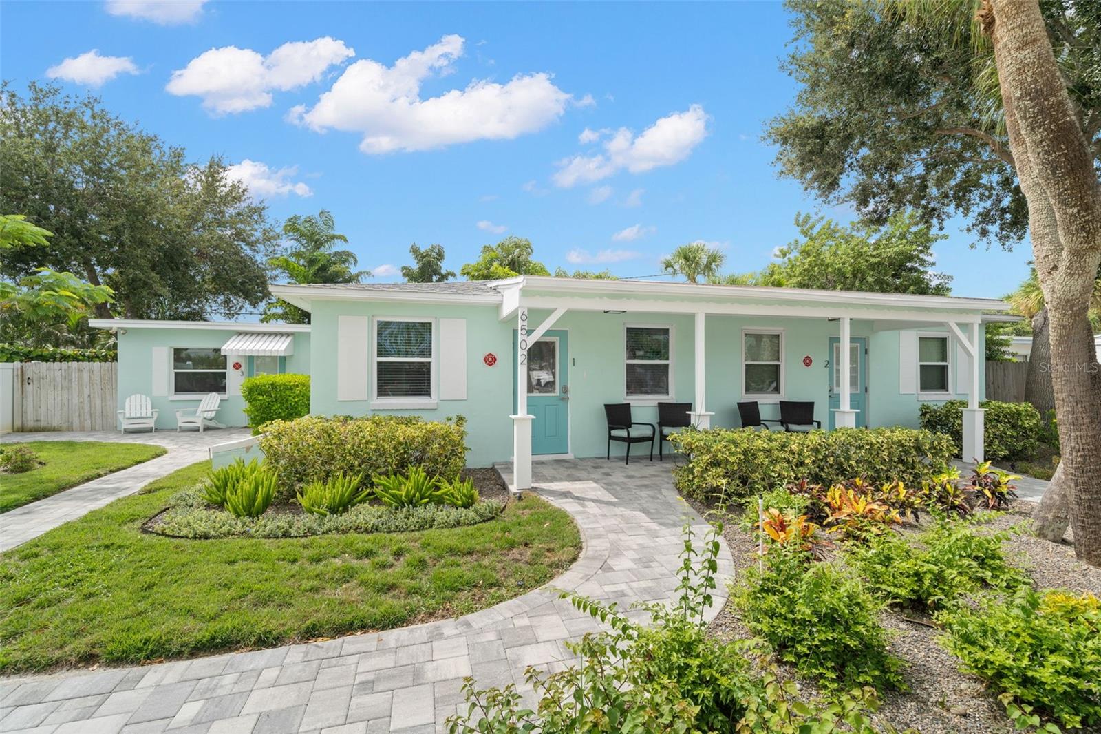 Available late August through end of October. No Annual leases. This is it; your perfect beach cottage awaits! Walk to stunning St Pete Beach, shops, restaurants, and lively beach bars - no car needed. Built in the 1940's, this charming bungalow has been completely remodeled and fully furnished with monthly rental price including all utilities, lawn care, cable, internet, pest control and more. Throughout, you'll find a beautiful, open concept layout with luxury vinyl flooring and lovely coastal decor. The kitchen boasts new cabinetry, quartzite countertops, Fisher & Paykel appliances, and an induction cooktop. The en suite bathroom is freshly tiled and features a walk in shower. All windows and doors are hurricane rated for your protection in the event of a storm. If a modern concept is your style, look no further. Outside, you'll find a private patio, grill, lounge area, and privacy fenced side yard for pets. A separate shared space is also fenced and includes washer/dryer, outdoor shower, beach chairs and umbrella, as well as two bicycles for your use. Book today and start living on island time!