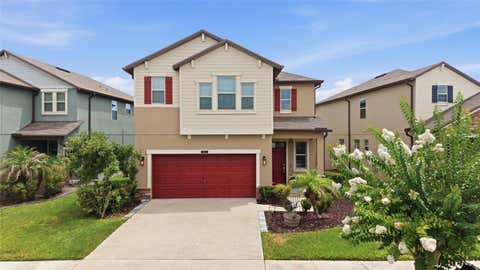 Photo of 8928 Flourish Drive, Land O Lakes, FL 34637 (MLS # TB8517348)