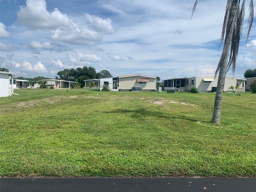 Photo of 235 Estrada St, North Port, FL 34287 (MLS # TB8303059)