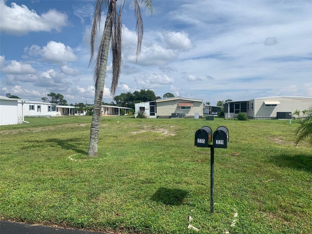 Photo of 235 Estrada St, North Port, FL 34287 (MLS # TB8303059)