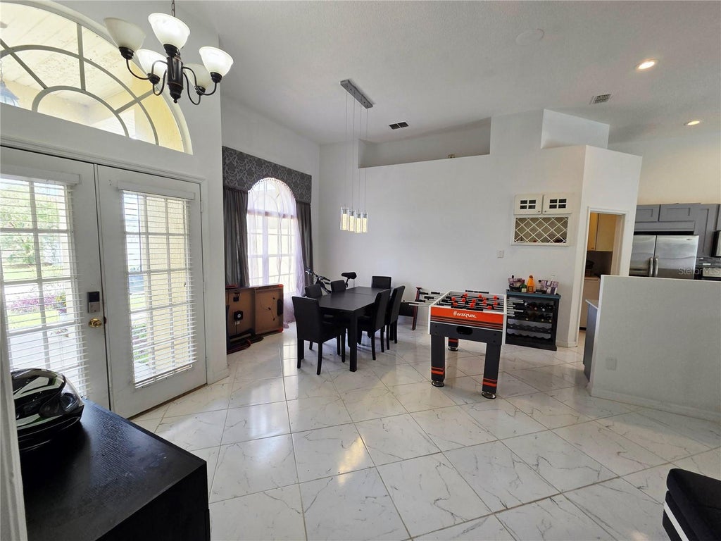 Photo of 10 Nevada Loop Road, Davenport, FL 33897 (MLS # S5148936)