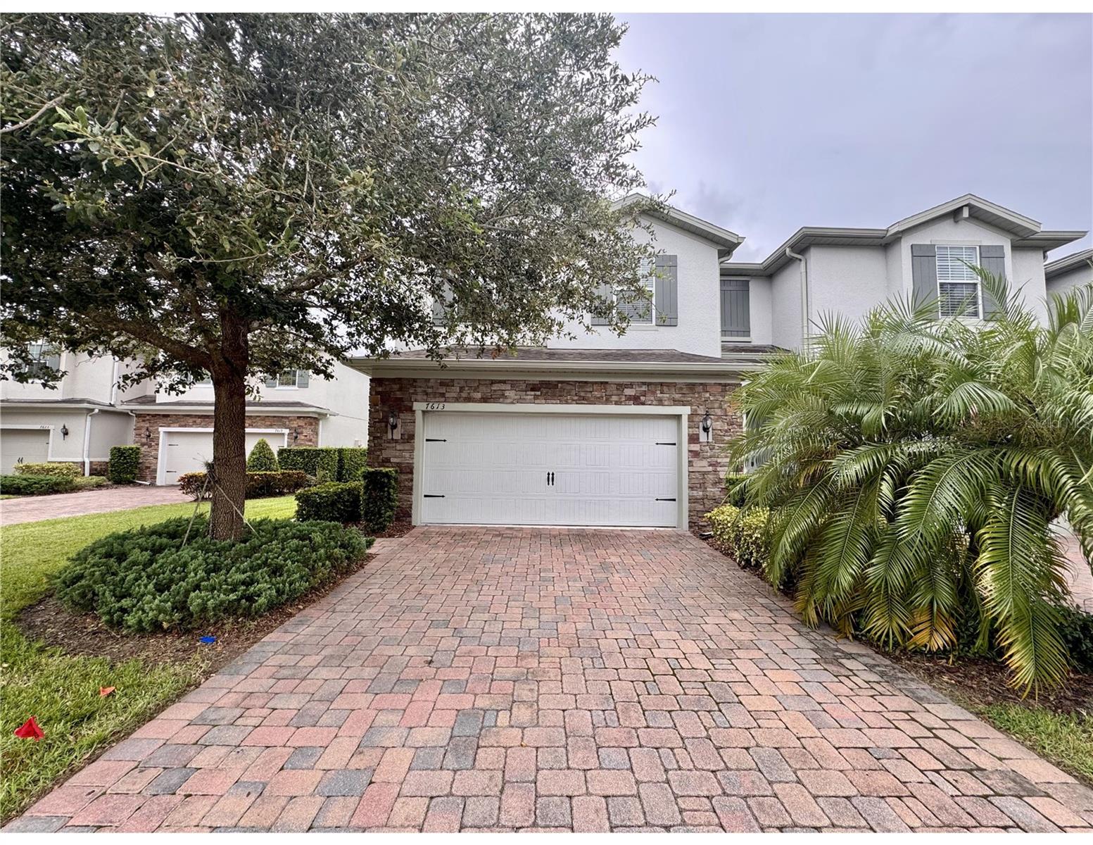 Beautiful town home in the gated community of Aloma Trails! This 3 bedroom, 2.5 bath, 1,787sqft, two-story town home will be ready for you to move in! The town home features an open floor plan with 18" tiled floors throughout the first floor living area, kitchen and dining room, all bathrooms and the inside utility room. The kitchen features dark walnut 42" cabinetry, granite counter tops, plenty of cabinet storage, counter top and preparation space, a very large kitchen island, large walk-in pantry and stainless steel appliances including the refrigerator, stove, over-the-range microwave, dishwasher and disposal. With views of the backyard through the double sliding glass doors, the kitchen, living room and dining room enjoy plenty of natural light and an open and expansive feel. On the second floor, you will find the master and guest bedrooms, guest bath, inside utility room and plenty of storage in the multiple linen closets. The master bedroom suite is separated from the guest rooms giving it a very private feel and with en-suite bath featuring dual vanity sinks, glass enclosed shower, large walk-in closet and plush carpeting it is everything one could ask for in a master bedroom! The guest bedrooms are well-sized with reach-in closets and have easy access to the guest bathroom. An oversized two-car garage,open patio overlooking the backyard and high efficiency AC and hot water heater round out this town home. With easy access to Park Avenue, UCF, Rollins College, shopping, dining and entertainment this is a wonderful place to call home!