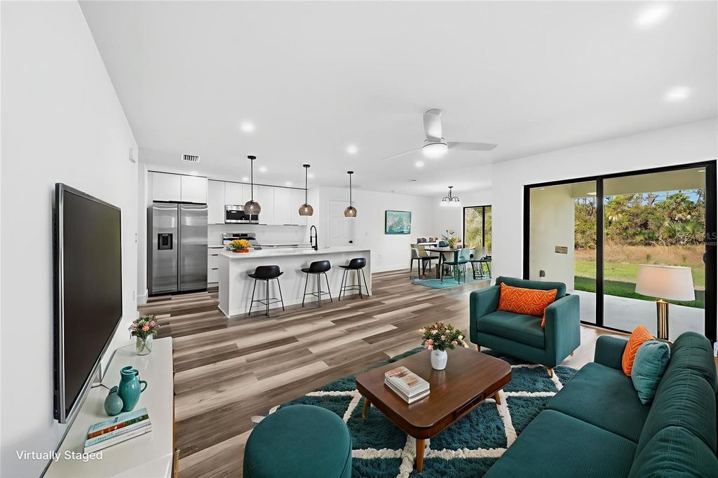 Photo of 15468 Chamberlain Boulevard, Port Charlotte, FL 33953 (MLS # C7519423)