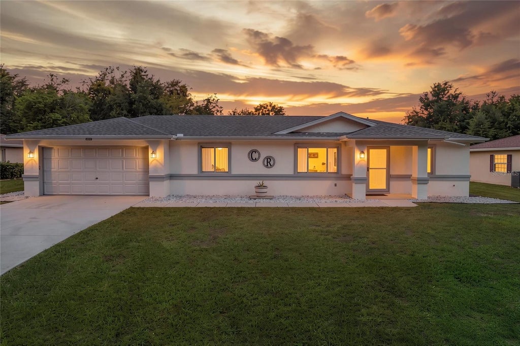 Photo of 10452 SW 62nd Terrace Road, Ocala, FL 34476 (MLS # OM734773)
