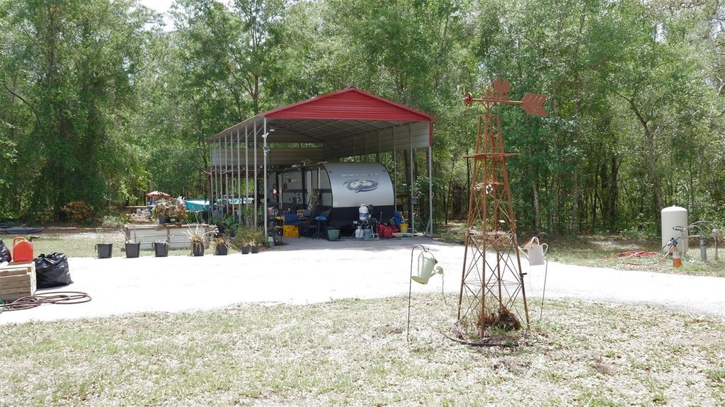 Photo of 17622 Caufield Road, Spring Hill, FL 34610 (MLS # W7884777)