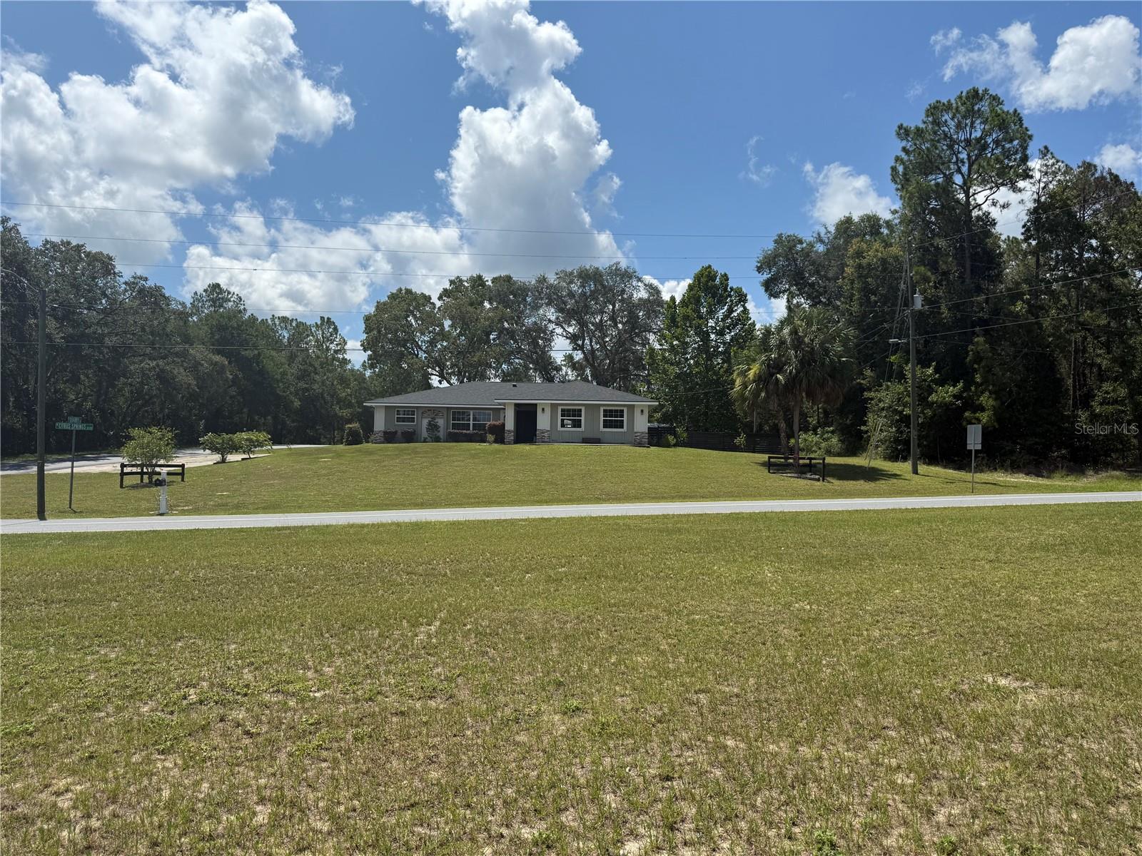 Unlock the potential in this nearly finished 4-bedroom, 2.5-bath gem on a half-acre corner lot in Citrus Springs—priced below market value! With a new roof (2024) and modern updates already underway, this home just needs a few finishing touches (and most of the supplies are included!). The fenced backyard features a playhouse and shed/workshop—perfect for playtime, hobbies, or storage. Located in a quiet neighborhood with quick access to everything the Nature Coast has to offer: spend your weekends tubing at Rainbow Springs, biking the scenic Withlacoochee State Trail, or teeing off at nearby championship golf courses. Whether you're looking for a forever home or a smart investment, this property is bursting with potential and outdoor adventure. Schedule your tour today and bring your vision to life!