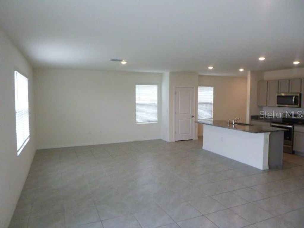 Photo of 9151 Forge Breeze Loop, Wesley Chapel, FL 33545 (MLS # TB8463034)