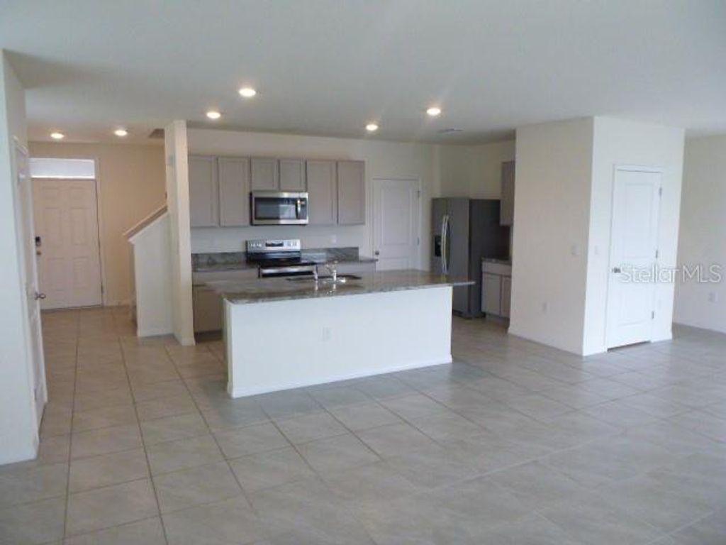 Photo of 9151 Forge Breeze Loop, Wesley Chapel, FL 33545 (MLS # TB8463034)