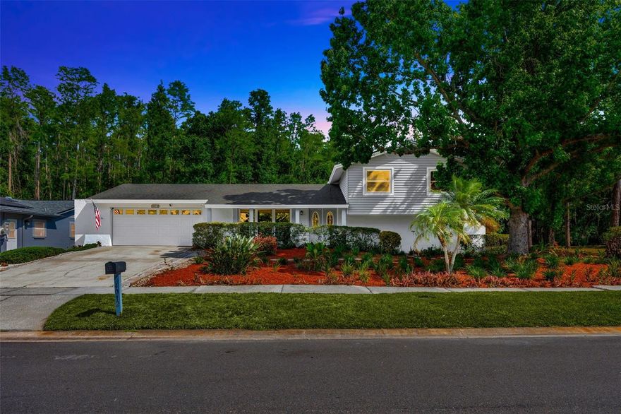 One or more photo(s) has been virtually staged. Space inside space outside

This 4 bedroom 3 bathroom home in Carrollwood boasts over 2000 sq ft on a corner lot. The layout of this home with the unique lower level makes it an ideal option for anyone needing an area within the home that can function as its own pseudo-suite. It's near magnet schools, all of the conveniences needed for everyday life, yet located on a deadend street it feels somewhat secluded. Beautifully landscaped and backs up to part of a conservation area. 
Solar panels are completely paid off on a roof has years of life left.

When stepping into this split-level home, you find yourself in the foyer. There's room for a settee and boasts two unique closet doors. Step further into the home and you're greeted by an area that could be used as either the front living room or a formal dining room. Continuing into the home there is the dining room and to the left, the recently renovated kitchen, to the right the sunken living room. Just off the sunken living room you’ll find the fourth bedroom across the hallway from that the third of three full bathrooms complete with walk-in shower. 
On the other side of the sunken living room is the entrance to the Florida room. As the Florida room has its own door to the outside, it’s easy to envision the versatility of this area; it can easily function as it's own living space.
Now, let’s travel back up those three steps and into the kitchen.
The kitchen was remodeled in 2007 including cabinets, can lights in the ceiling, granite countertops, breakfast bar with storage and tile flooring. In 2012 the tile backsplash was added. To round out the kitchen - a gas stove, stainless steel appliances and an amazing view of the backyard and the edge of the conservation area. 
The spacious primary and bedrooms 2 and 3 can be found on the second floor. In 2012 the primary ensuite was remodeled to include wood cabinets and granite countertops. This was the same for the 2nd bathroom upstairs and the 3rd bathroom downstairs.
In addition to the versatility and possibilities inside, are all of the extra bonuses on the outside. The home sits on a curve of the road where there is nothing but a plethora of woods and wildlife sightings. At dawn and dusk you’ll feel as if you’re in a Disney movie when deer wander out of the woods to frolic in your back yard(see pics). Speaking of the backyard, its landscaping is as equally impressive as the front yard while still leaving ample yard behind the home. 
Despite being surrounded by nature, you’ll find that your new sanctuary is also convenient to all of the things you’ll need for everyday life. Grocery stores, shopping, a post office, various restaurants and the well-known Bob Sierra Y are all less than 3 miles away. This well-maintained and well-loved home anxiously awaits its new owners as they take their turn in building a lifetime of memories within its walls.

***See attachment with additional information regarding the updates, renovations and maintenance. 
**Solar is completely paid off -Electric bills are currently under $20**
*Home reroofed in 2013 with Tamko 30 year shingle
*A/C 2011
*Tankless water heater 2020.
Home replumbed in 2020