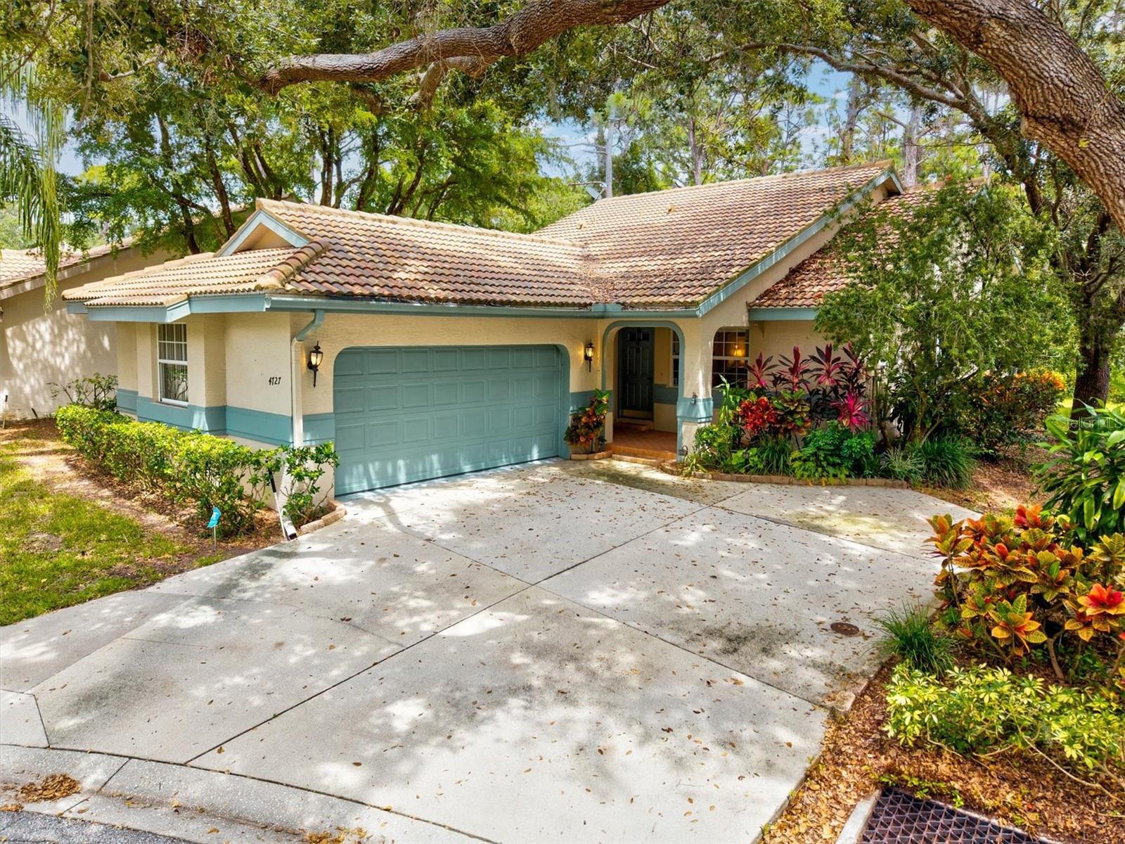 Welcome to Longwood Villas – a sought-after neighborhood known for its quiet charm paired with unbeatable convenience. This beautiful 3-bedroom, 2-bathroom home offers a spacious 2-car garage and a thoughtful layout designed to balance comfort, functionality, and style.
Step inside to a bright, open living space that flows seamlessly into the dining and kitchen areas—perfect for hosting gatherings or enjoying cozy evenings at home. BRAND NEW FLOORS in the living room add a fresh touch to the inviting interior. The kitchen boasts ample granite counter space and storage, an eat-in nook, making it just as ideal for meal prepping as it is for takeout nights.
The primary suite serves as your personal retreat, offering generous space to relax and recharge. Two additional bedrooms provide versatility—whether for family, guests, or a home office. Both bathrooms are well-appointed, designed to brighten your mornings and simplify your routines.
Outside, lush Florida landscaping surrounds the home, creating a private tropical escape. Best of all, your HOA covers exterior painting, roof maintenance, minor exterior repairs, and yard care—including fertilizer—allowing for true low-maintenance living.
Life in Longwood Villas means you also enjoy Tivoli Village amenities, including four spring-fed lakes, fishing, scenic nature trails, and the shade of majestic oak trees. All this is paired with prime access to UTC, I-75, Benderson Park, SRQ Airport, and just an 18-minute drive to vibrant downtown Sarasota. World-famous Siesta Key Beach is only a short drive away, offering turquoise waters and pristine white sand.
This isn’t just a house—it’s a lifestyle. Whether you’re starting a new chapter or searching for your forever home, this property checks all the boxes. Schedule your private showing today and step into the Sarasota lifestyle you’ve been waiting for!