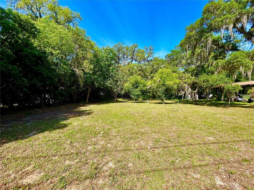 Investor alert!! Super convenient location close to downtown Belleview!  This .35 acre lot is mostly clearly with a few beautiful trees remaining. It’s large enough for a big family home but zoned R2 so you could build a duplex for investment. It sits between a single family home and a duplex.  Although it is on a dirt road, it is the first lot on SE 62nd street so only a very short drive on dirt.  Can easily be paved to your driveway if desired. High and dry not in a flood zone. Only one other property before the dead end of the street.  Electricity nearby, will require well and septic but then never any utility bills for water and sewer. NO HOA restrictions or fees!i