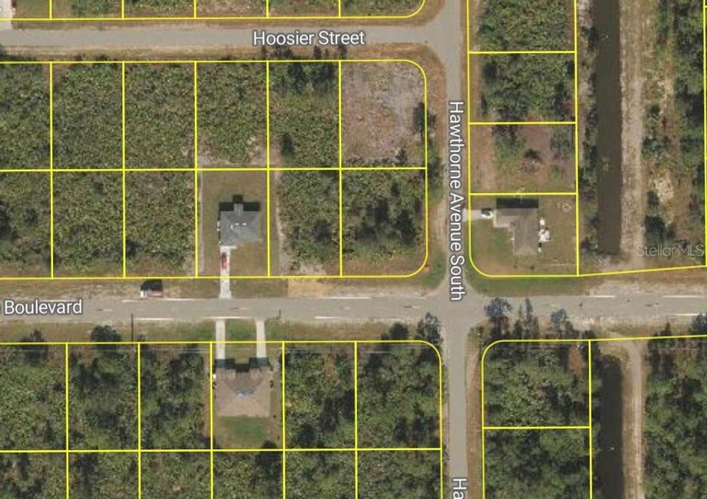 Photo of 885 Milwaukee Boulevard, Lehigh Acres, FL 33974 (MLS # O6401626)