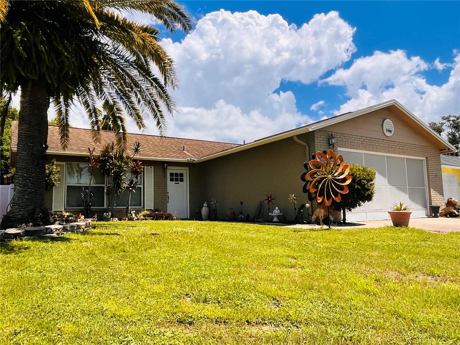 Get ready to live your best life in this charming 2-bedroom, 2-bathroom home, which has substantial space to create a 3rd bedroom! Also, Freedom to do as you please. Why? No HOA or CDD!! That's right, NO HOA & NO CDD means you can park your boat, paint your door any color you want, and generally do whatever you please without a committee's approval. This home is a true Florida veteran, having laughed in the face of every hurricane without ever flooding. It’s a fortress, but with more ceiling fans. Step inside and feel the cool vinyl tile under your feet as you enter the spacious living room to create your relaxing environment. The primary bedroom is equally generous, offering plenty of space to stretch out and have your own personal oasis. With ceiling fans in every room, you'll stay cool and comfortable, even on the stickiest Florida days. But the real magic happens outside. The beautiful lanai is the perfect spot for sipping your morning coffee, reading a book, or just enjoying the gentle breeze. The backyard is a private paradise, featuring an above-ground pool for those hot summer days and not one, but two sheds! The first is perfect for stashing your gardening tools and pool floats, while the second is an extra room! Your very own backyard escape. It's the perfect spot for a home office, a She-Shed, a Man Cave, or a place to hide from the rest of the family. With a new AC unit from 2020 and a 4-POINT INSPECTION ALREADY COMPLETED, this home is ready for you to move in and start relaxing. BUT Wait- There is a 2-car garage! Your new sanctuary for all things practical and profoundly impractical. This isn't just a place to park your vehicles; it's a blank canvas for your wildest dreams, provided those dreams involve power tools, organized clutter, and a faint smell of motor oil. Don't miss out on this fantastic opportunity to own a piece of paradise! Make your appointment to see Your New Home!