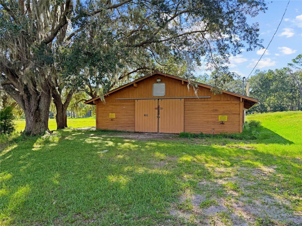 Photo of 15601 Patriot Drive, Brooksville, FL 34601 (MLS # TB8556479)