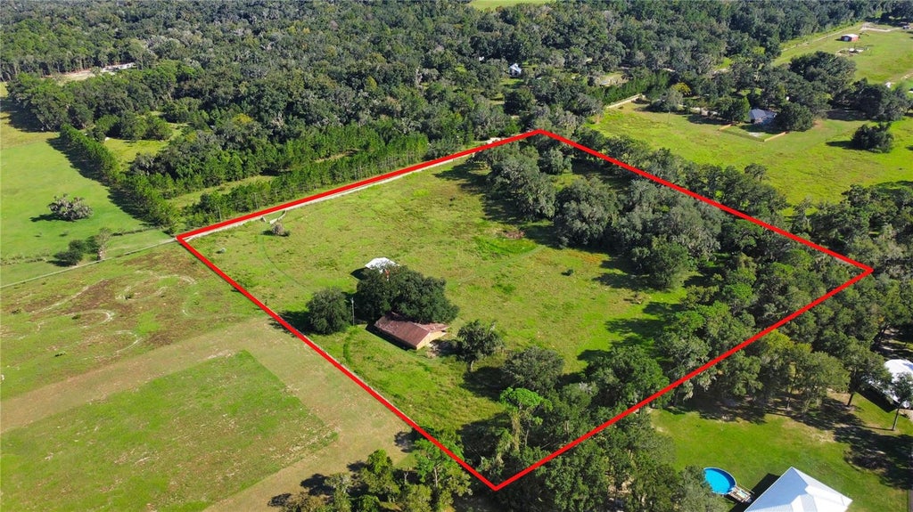 Photo of 15601 Patriot Drive, Brooksville, FL 34601 (MLS # TB8556479)