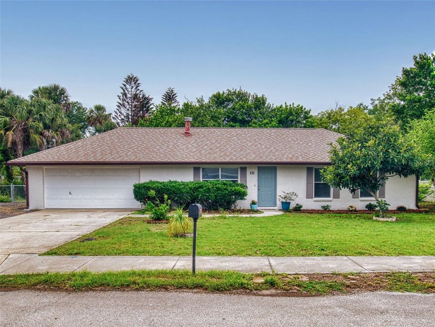 This well-built move in ready concrete block home has been recently updated with beautiful new kitchen cabinets and stunning quartz countertops and is located in a highly desirable Riverside neighborhood, offering easy access to the scenic Riverside Drive walking and biking path, nearby parks, marinas and grocery shopping. The bathrooms have updated vanities,quartz counter tops, toilets and showers and the exterior of the home has been freshly painted. 
Just 10 minutes from New Smyrna Beach via either causeway, you’ll enjoy quick access to top dining, entertainment, and local events.
Situated on a fully fenced 1/3-acre lot with two gated entrances, the property offers both privacy and convenience. Step out from the kitchen onto a spacious patio—perfect for outdoor dining or relaxing in a shaded, garden-like setting.
Additional features include a dedicated space to park and hookup your RV and an attached oversized two-car garage with ample space for vehicles, storage, laundry, or even a workshop. Roof (2018) A/C (2023) Water Heater (2024)