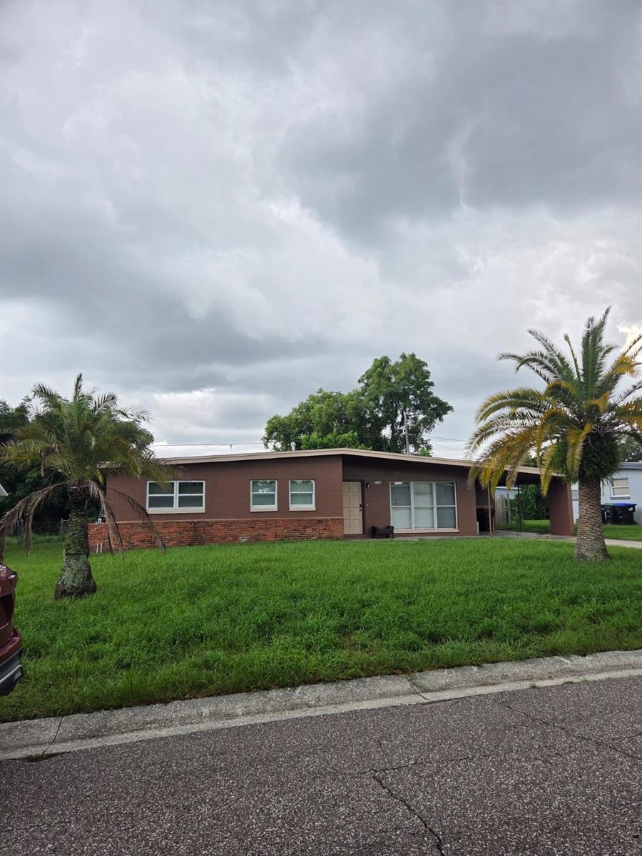 Photo of 5930 Forest Grove Boulevard, Orlando, FL 32808 (MLS # S5157122)