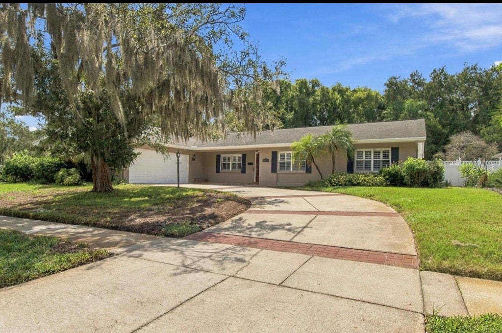 Photo of 11626 Carrollwood Drive, Tampa, FL 33618 (MLS # TB8552346)