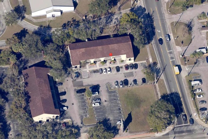 Commercial unit conveniently located in a high-traffic neighborhood plaza near major tourism corridors. The surrounding area includes a strong mix of residential communities, hospitality, and short-term rentals. The property is currently occupied by an operating business. The business is not included in the sale, and it is listed separately.