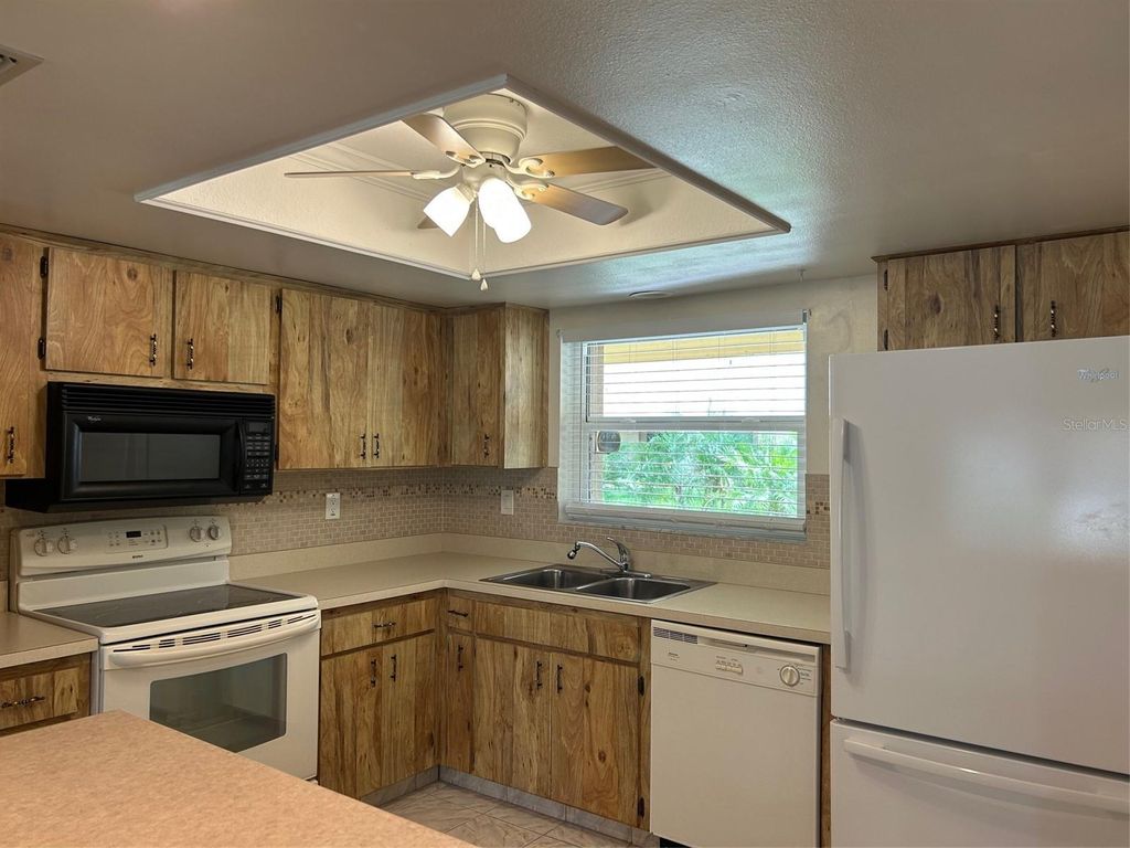 Photo of 2567 Oakleaf Lane #41B, Clearwater, FL 33763 (MLS # TB8381894)