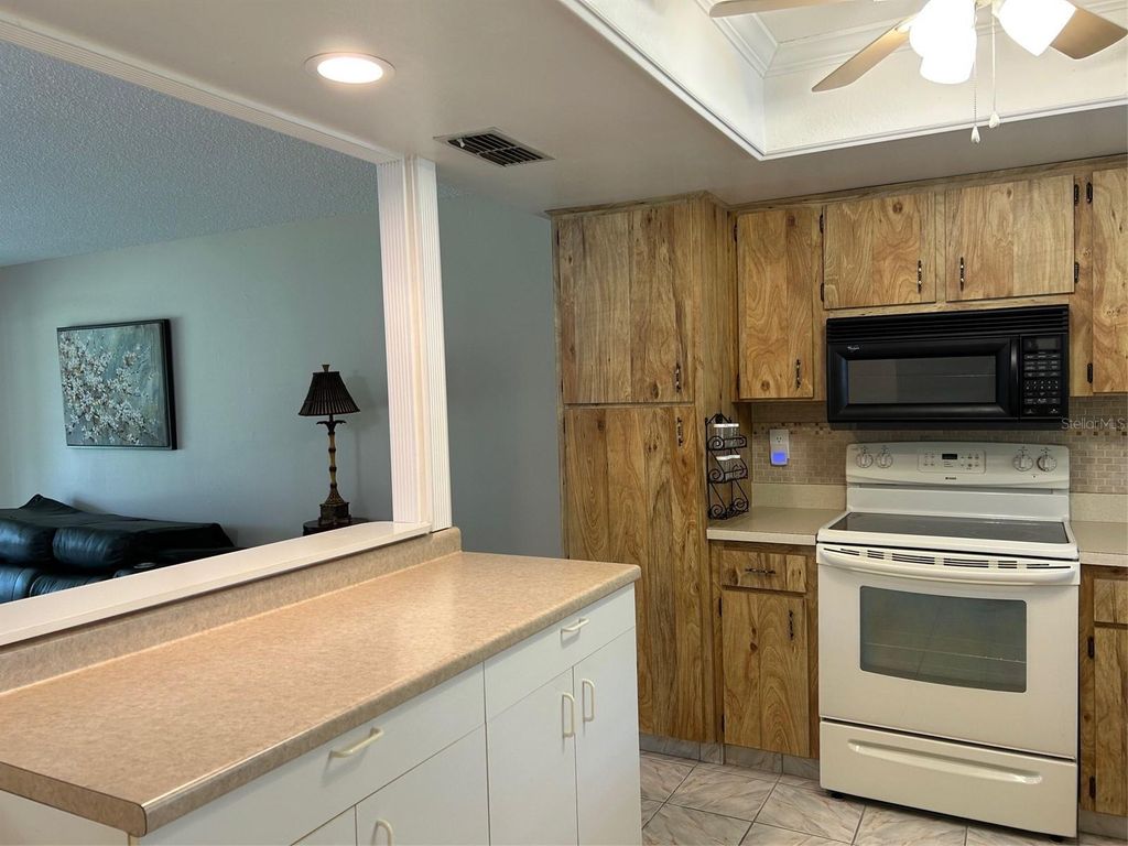 Photo of 2567 Oakleaf Lane #41B, Clearwater, FL 33763 (MLS # TB8381894)