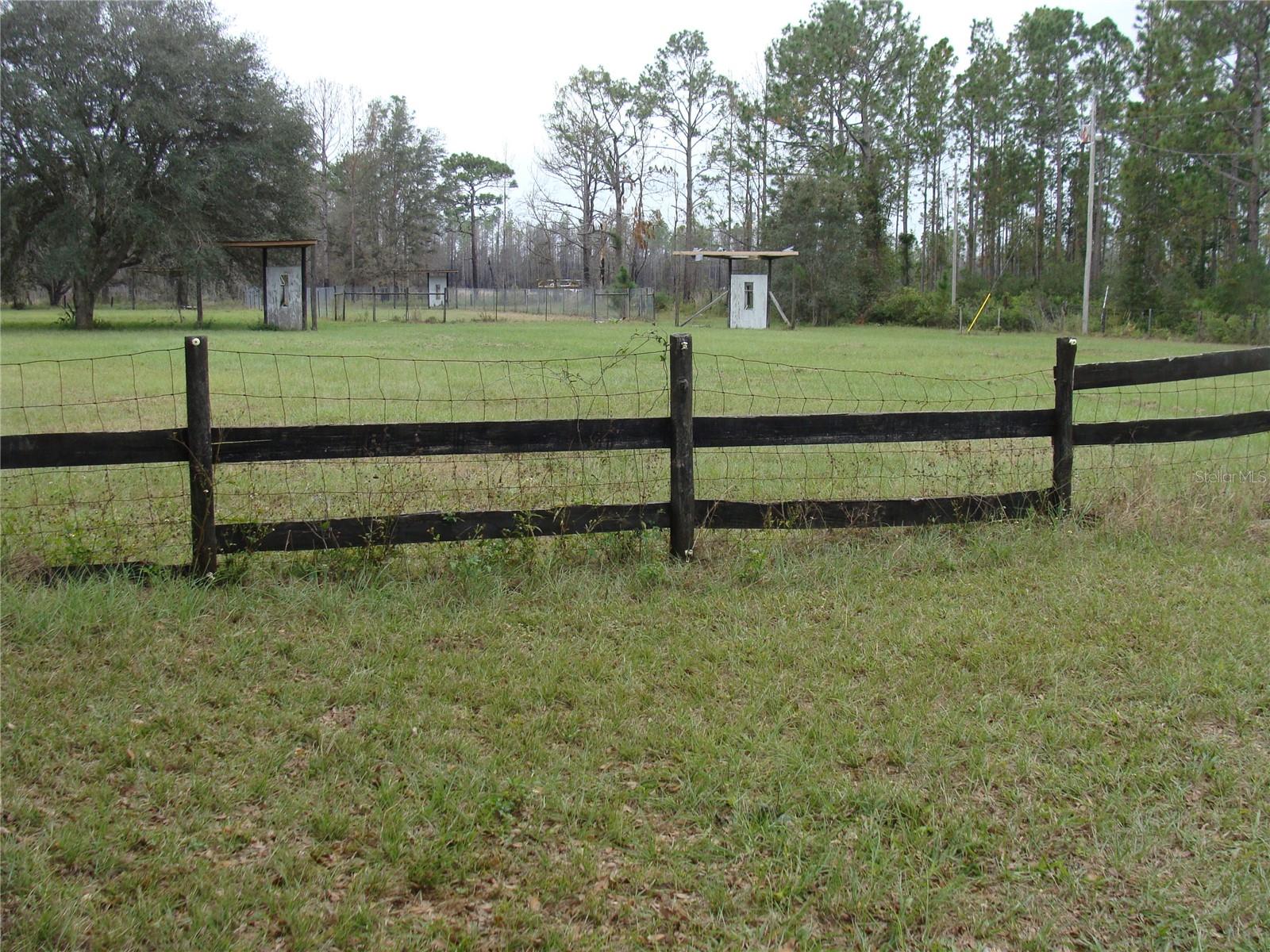 This 117 acres farm is beautifully located close to the I-75 and 326 exit. Also 15 minutes drive to the heart of town. Completely fenced and cross fenced. Has a huge metal barn and two paddocks with a total of 9 stalls. There are 3 functional wells and a single wide mobile home that needs extensive repairs. Property presently has cattle. Previously it was a horse farm (Pleasant Crest Farm). Cattle, machinery and equipment do not convey. This entire property is two parcels combined. The parcel numbers are 12759-000-00 and 12964-000-00. As per the county zoning office, this property has approximately 0.5 acre in one remote corner that is in flood zone; the remainder is not. Also, the county estimated frontage of this property is 4,300 feet.