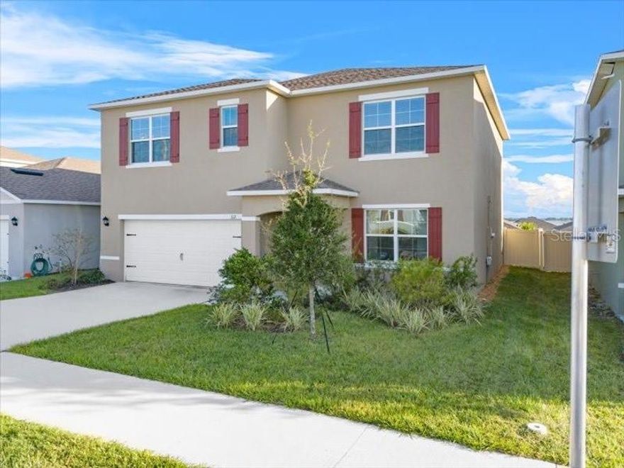 Welcome to 112 Sofia Lane in the sought after community of Eden Hills in Lake Alfred, Florida. This immaculate and well maintained, better than new, home features 5 bedrooms and 3 full size bathrooms in a two-story setting. The open floor plan offers a spacious living room area and a kitchen with stainless steel appliances, beautiful ceramic tile and upscale carpeting throughout. One large bedroom and a full size bathroom is on the first floor, perfect for guests, an in home office or Mother-in-law quarters. The upstairs includes an oversized primary bedroom suite that is nothing short of luxurious and comfort at your fingertips. Three more bedrooms are located in a split setting on the second floor offering privacy and serenity. The loft area features a large picture perfect window overlooking the nearby lakes. You can't go wrong with the privacy fence in the backyard, that is big enough for a garden or gatherings. The resort style community pool with a cabana and waterfall will be the envy of all of your friends while you enjoy the Florida lifestyle. This home is ready for it's new owners! Call today for your private showing.